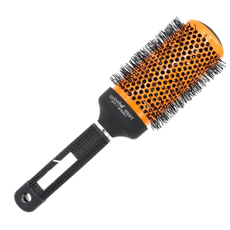 Brosse brushing cheveux frisés latérale